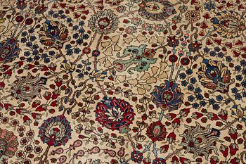 A Tabriz carpet, c. 385 x 287 cm.
