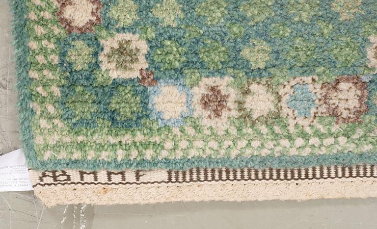 GALLERIMATTA. "Bankrabatten grön". Flossa. 310,5 x 111,5 cm. Signerad AB MMF BN.
