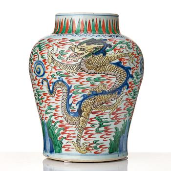 A matched pair of Transitional Wucai jars, 17th Century.