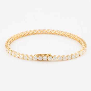 Tennis bracelet, 18K gold with brilliant-cut diamonds.