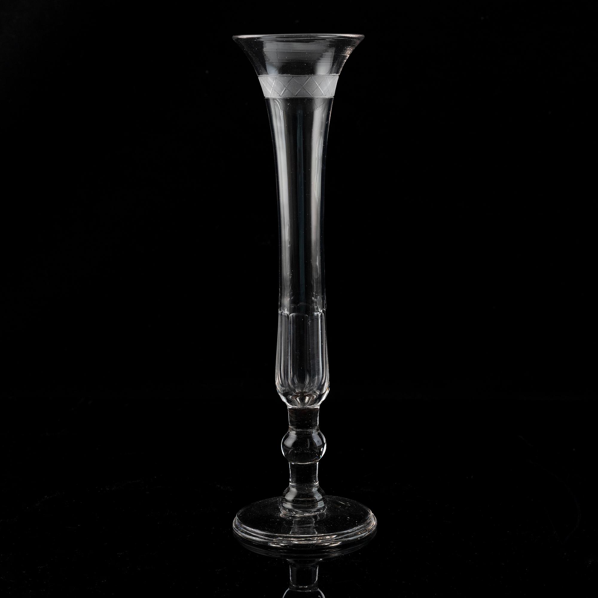 A set of nine early 19th century champagne flutes.