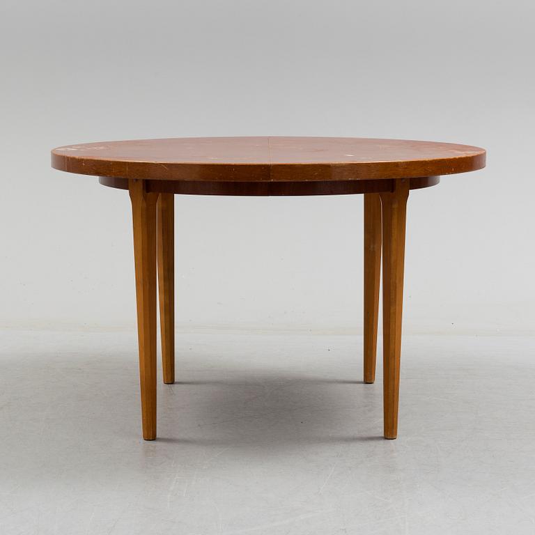 A 1940s mahogany veneer table.