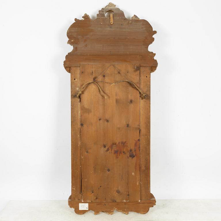 A Rococo style mirror, second half of the 19th Century.