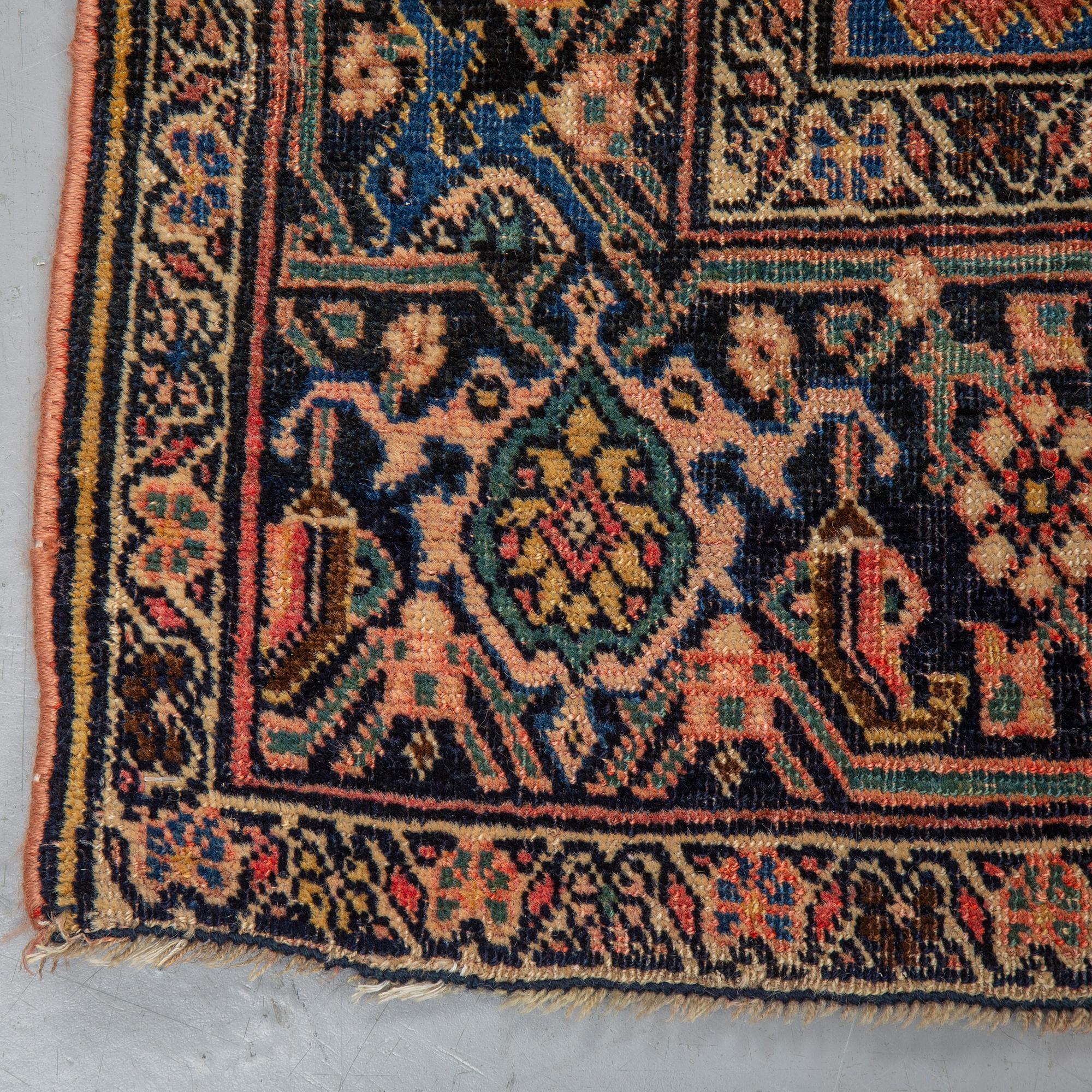 MATTO, an antique Bidjar, ca 220-228 x 138-141 cm.