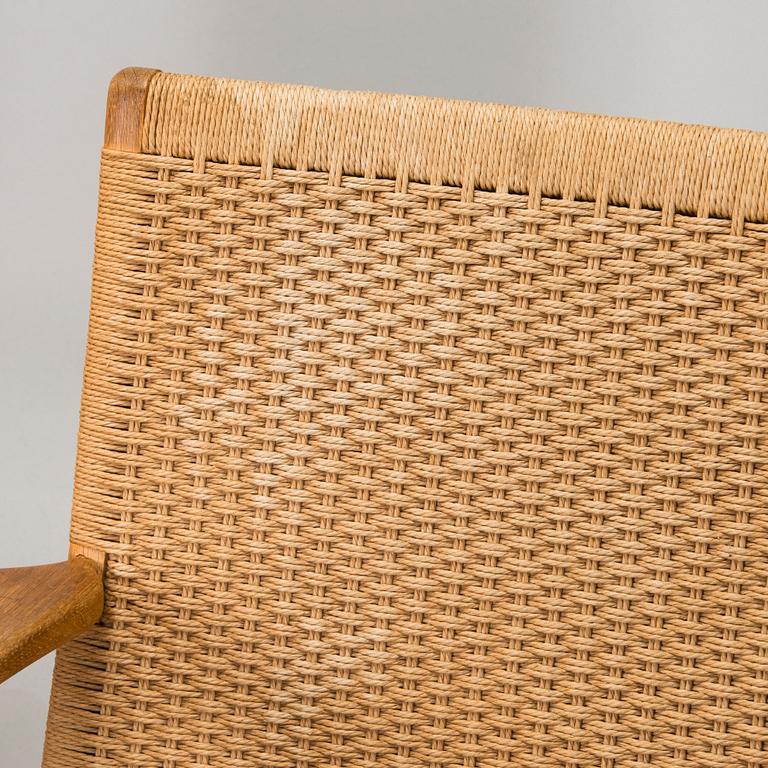 Hans J. Wegner, Armchairs, a pair, "CH25", Carl Hansen & Son, Denmark, 1960s.