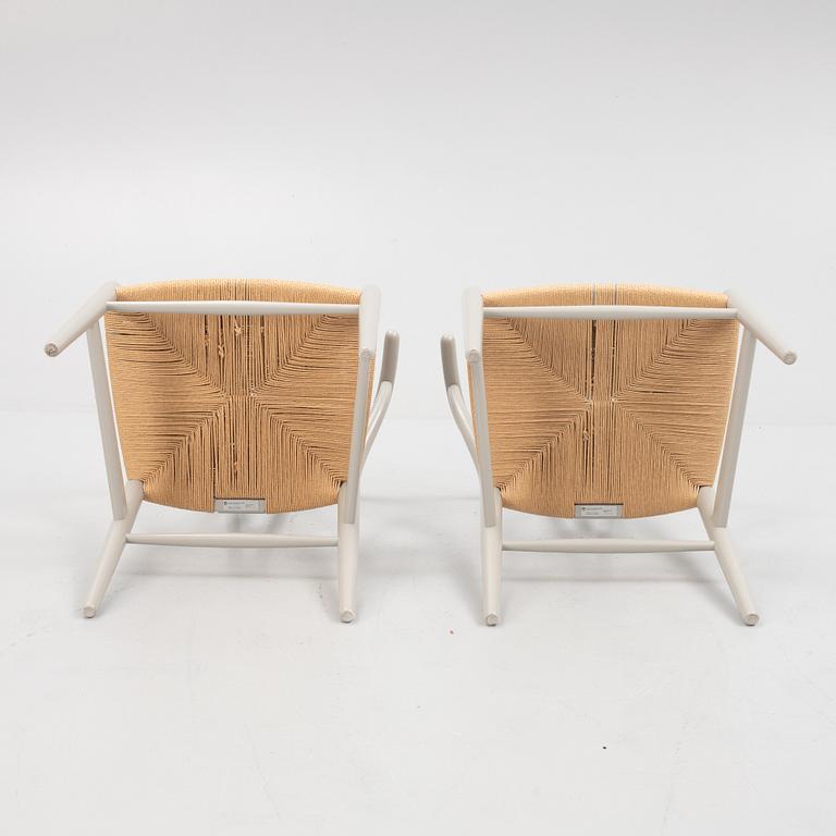 Hans J. Wegner, a pair of model 'CH-24' chairs, Carl Hansen & Søn, Denmark.