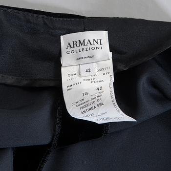 ARMANI, a pair of black velvet trousers and a west, size 42.