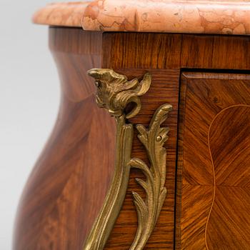 An early 20th century Central Europe Louis XV style chest of drawers.