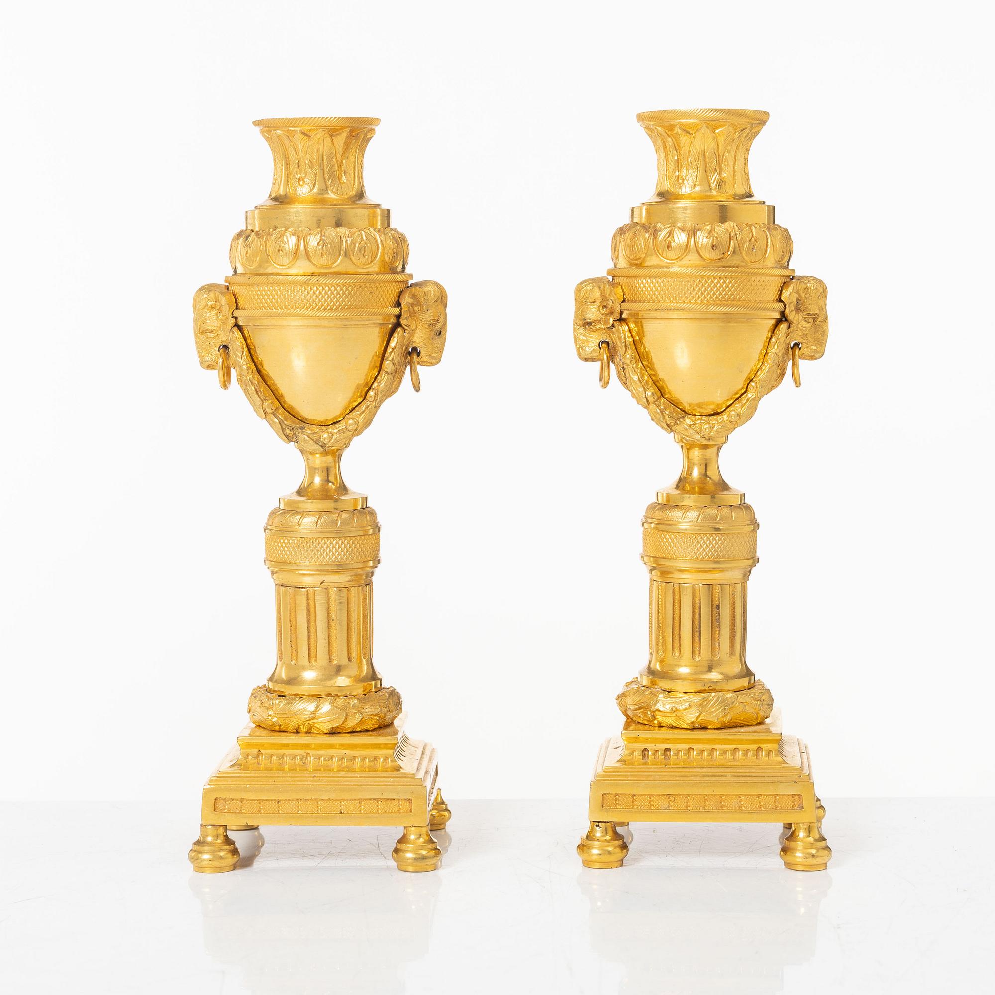 A pair of French Louis XVI style gilt-bronze casolettes, later part 18th century.