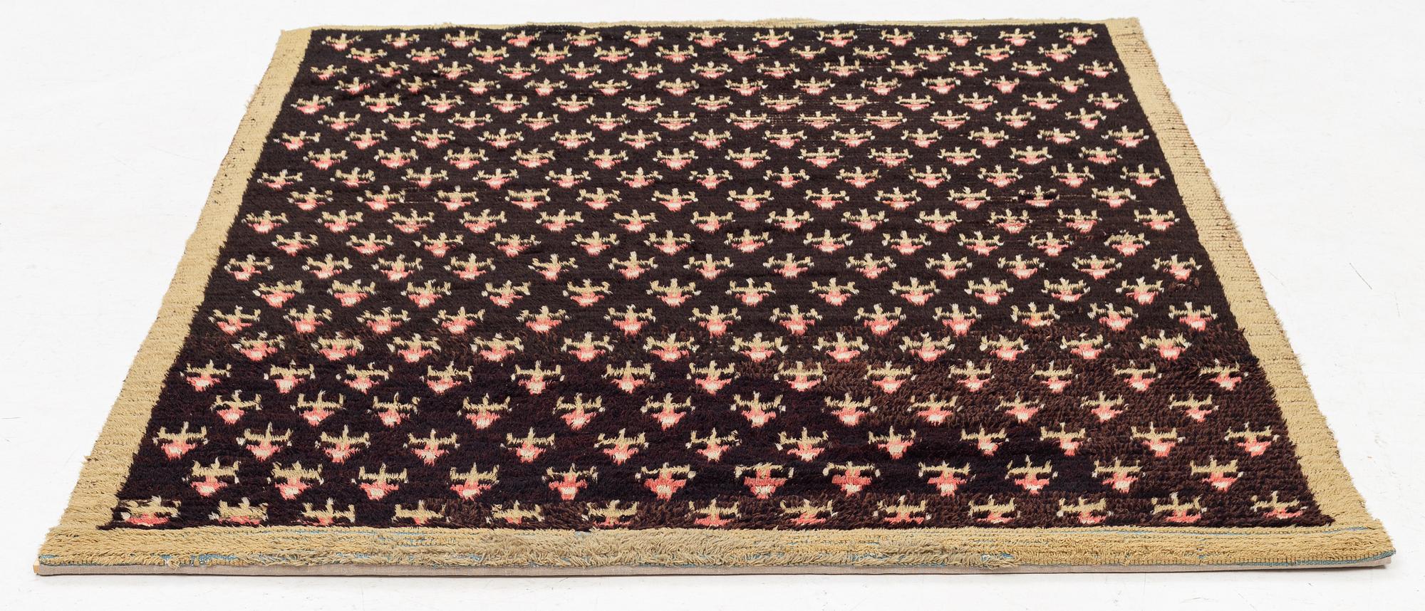 A knotted pile rug, Sweden/Finland, 18th/19th Century, c. 190 x 158 cm.