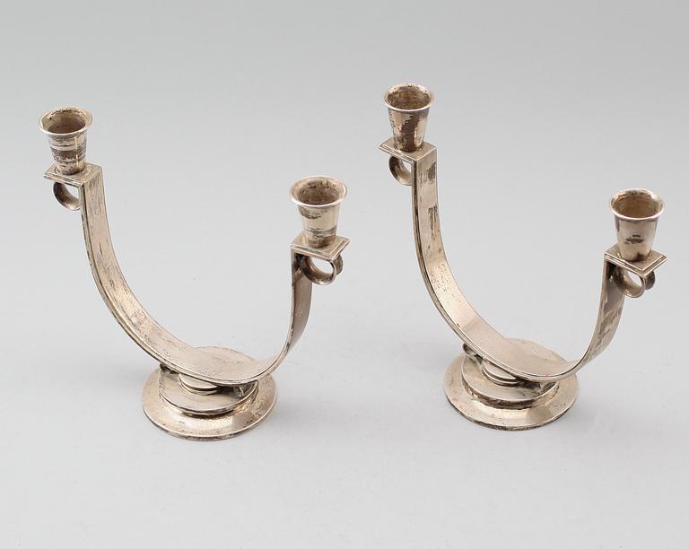 A pair of Gunlach Pedersen sterling candelabra, Georg Jensen, Copenhagen 1925-32, design nr 623.