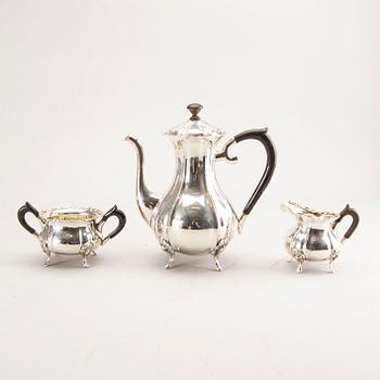 A 20th century German three parts silver tea service with Swedish import stamps.