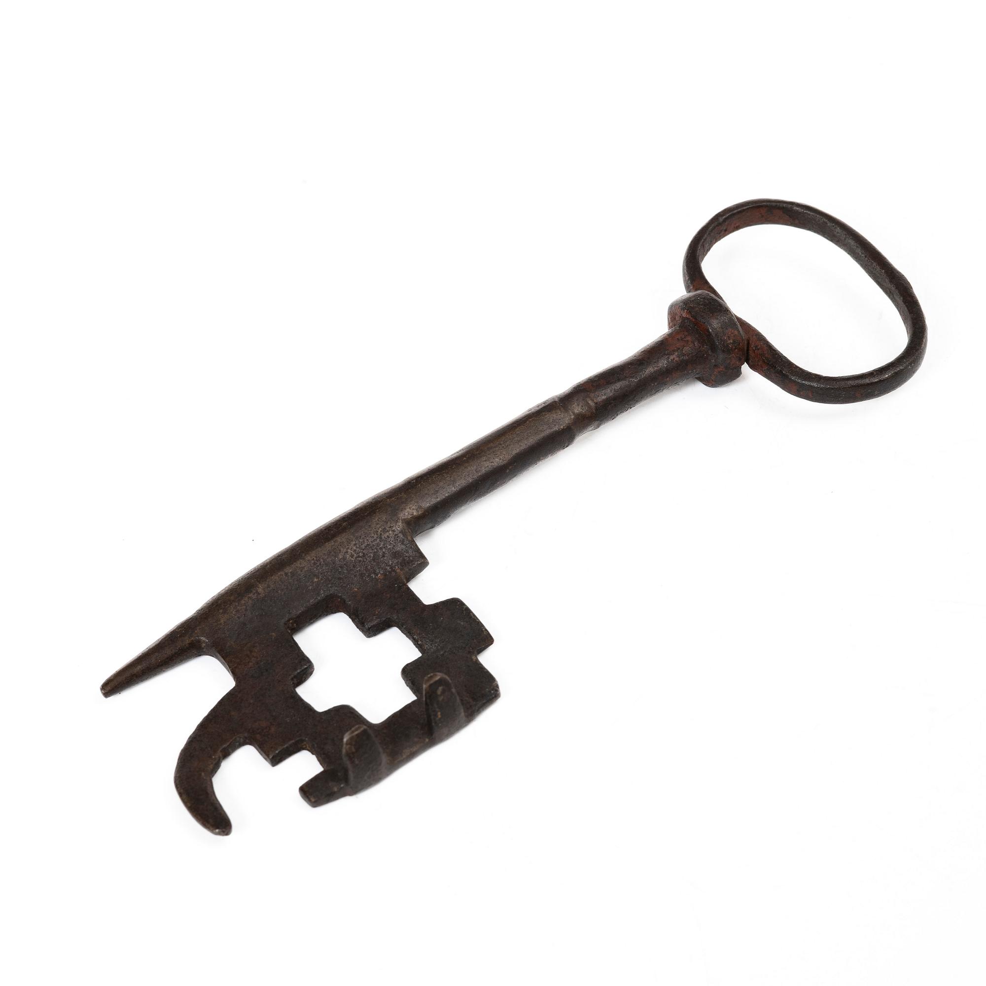 A set of a wrought iron key and wick snuffer, 17th - 18th century.