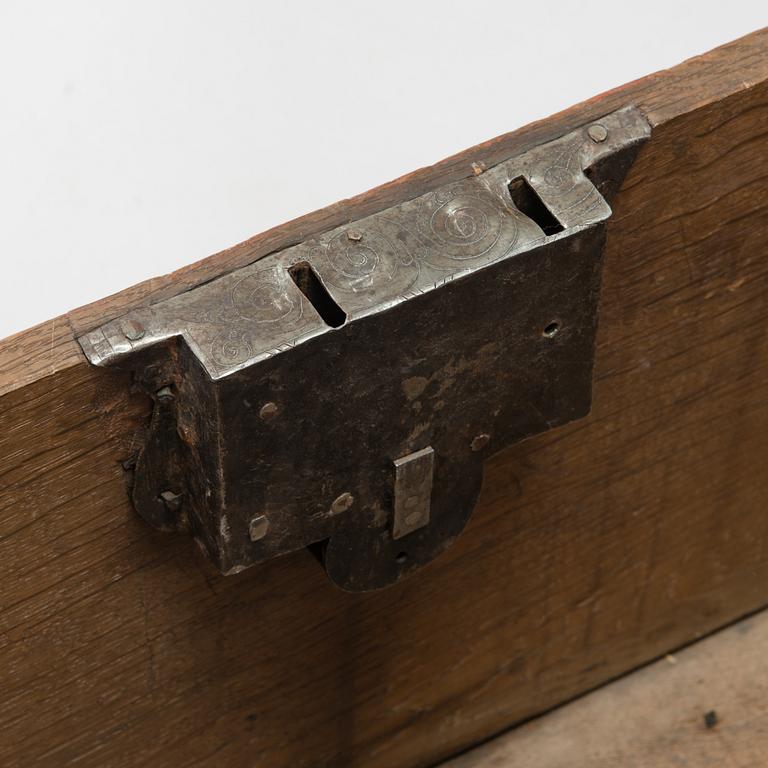 An oak wood chest dated 1710.