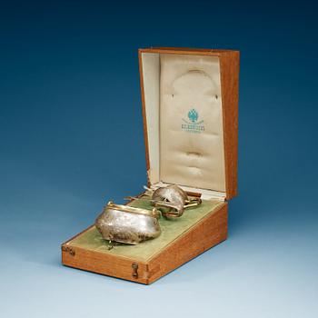 907. A Russian early 20th century cream and sugar set, marks of Alexander Fulid, Moscow and Karl Selenius, St. Petersburg.