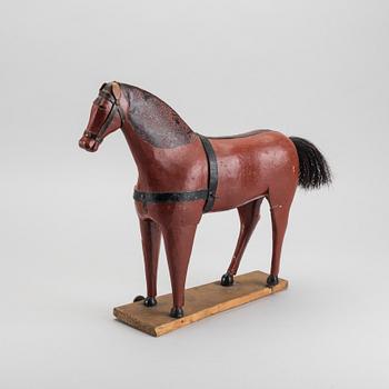 A toy wooden horse, late 19th cenury / turn of the century 1900.