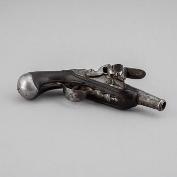 A 18th Century flintlock pistol.