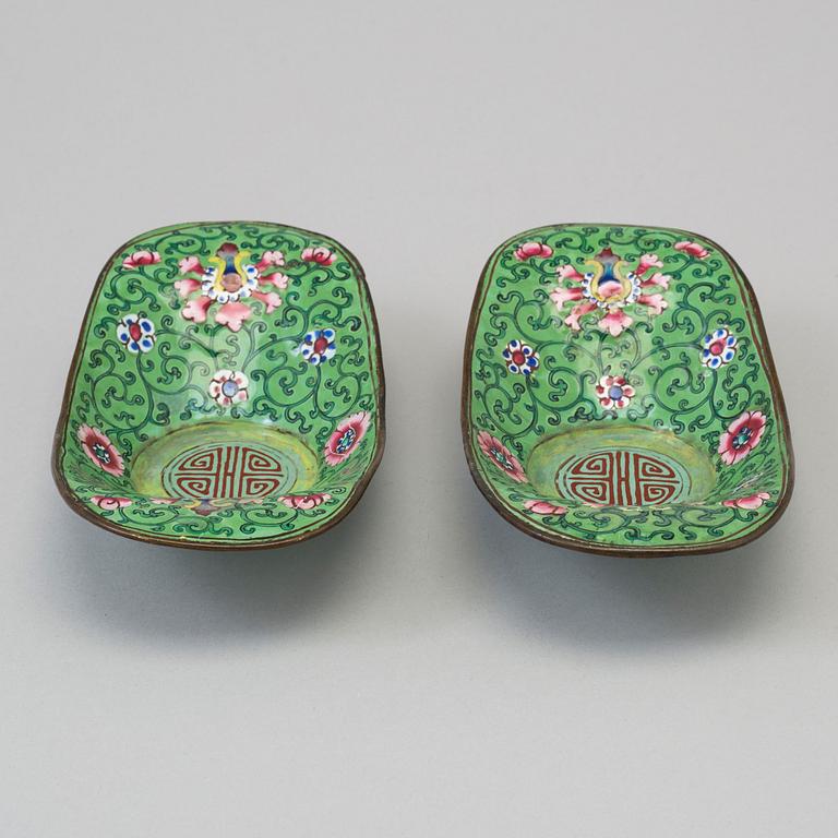 A pair of circa 1900 Qing dynasty enamel saucers.