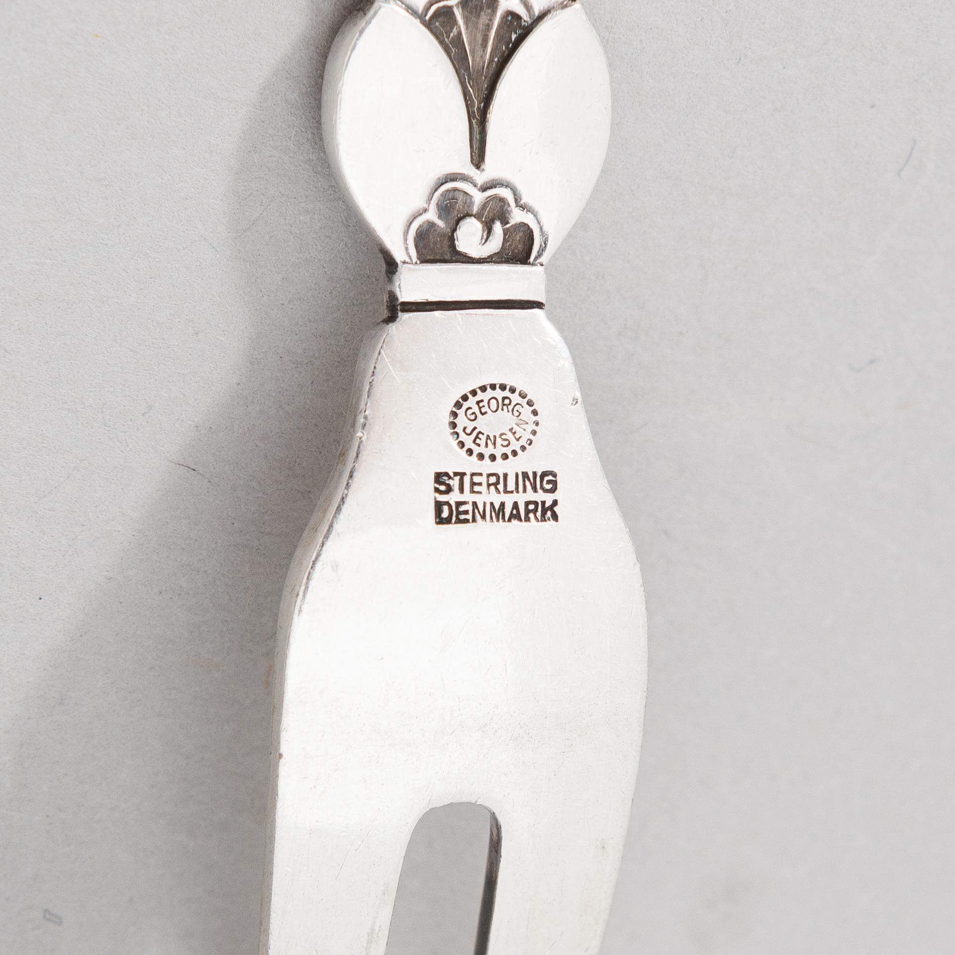 A 5-piece set of sterling silver 'Cactus' serving cutlery by Gundorph Albertus for Georg Jensen & Wendel A/S, 1945-1951.