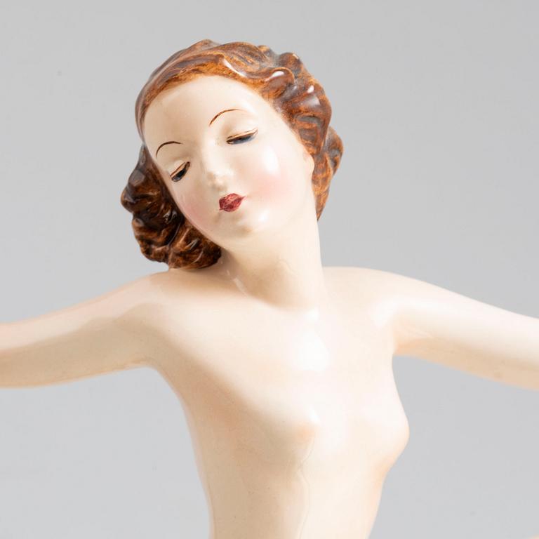 A porcelain figurine by Goldscheider, Vienna.