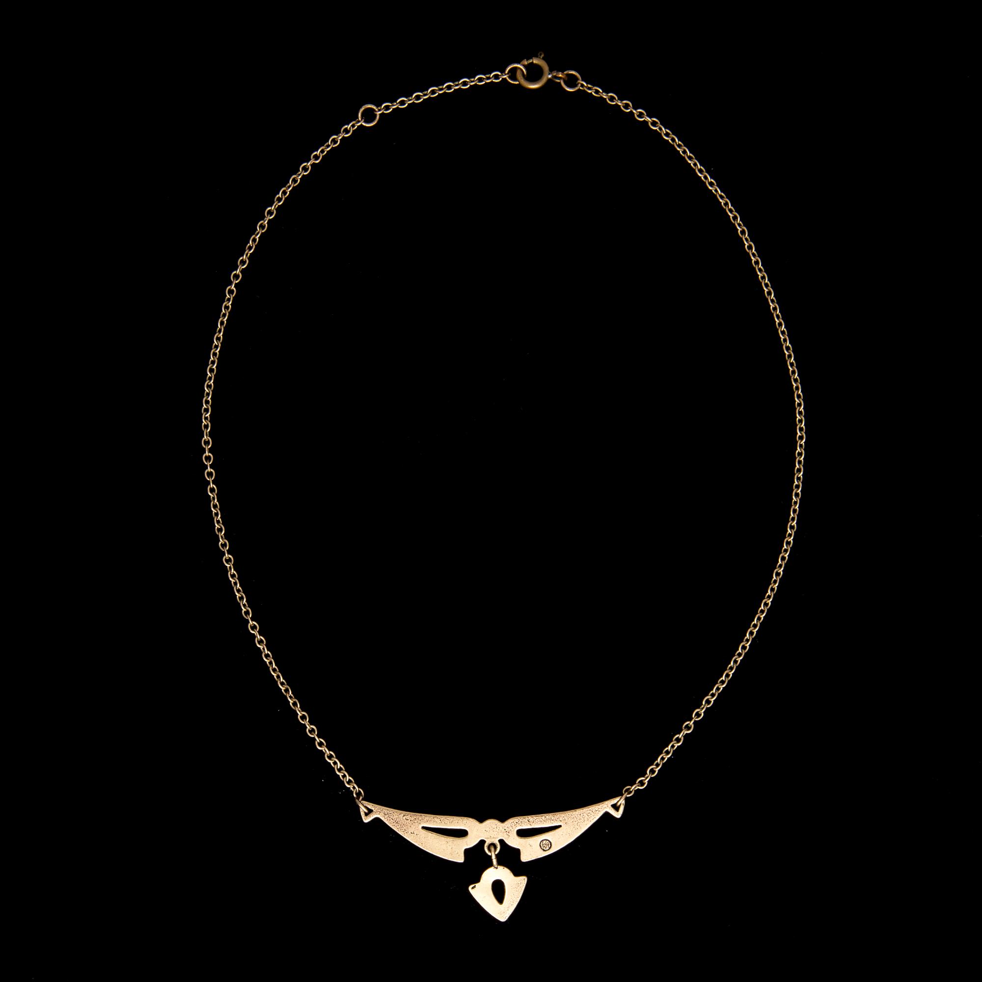 HALSSMYCKE, "Illusioni", brons, cabochonslipad granat, Kalevala Koru.