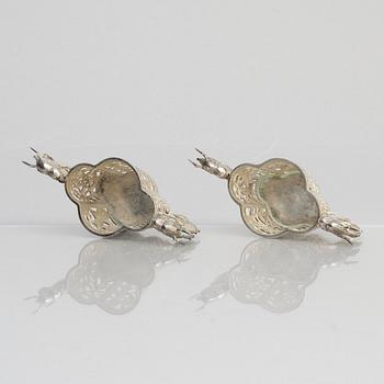 A pair of  Chinese silver cup holders/salts, 20th century.