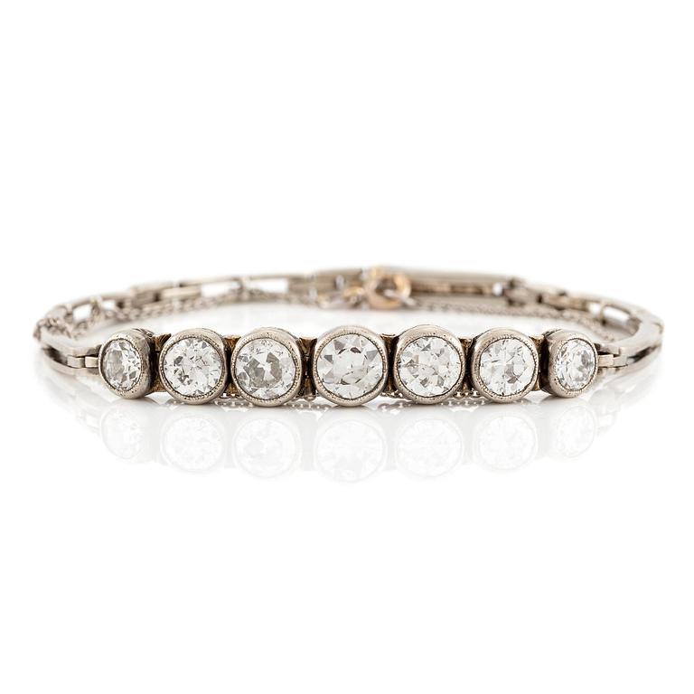 A bracelet in 14K white gold set with old-cut diamonds.