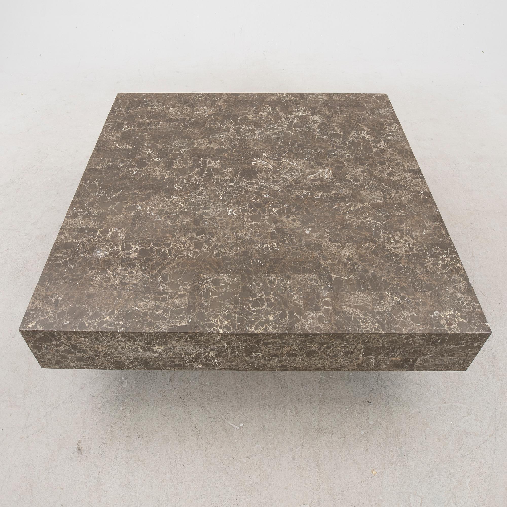 A late 20th century travertine coffee table.