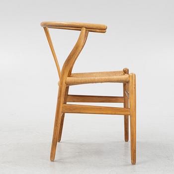 Hans J Wegner, a model 'CH 24' beech chair, Carl Hansen & Son, Odense, Denmark.