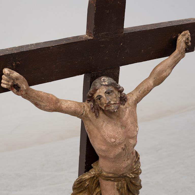 A 17TH CENTURY WOODEN CRUCIFIX, baroque.