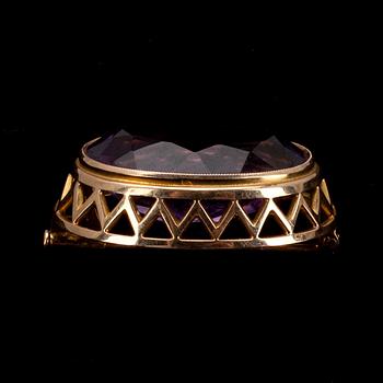 BROSCH, ametist ca 18 ct. 14K guld. Torbjörn Tillander Helsingfors 1969. Vikt 9,9 g.