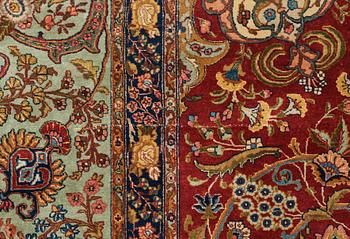 A CARPET, a semi-antique Tabriz, ca 339 x 253,5 cm.