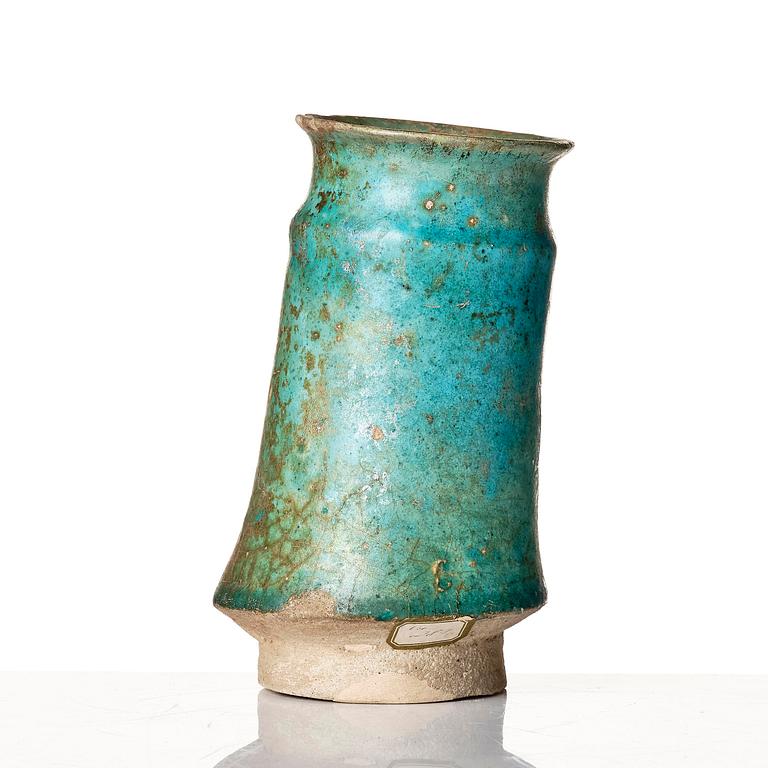 A Kashan Turquoise glazed pottery vase, central Persia (Iran), 11th to 12th century.