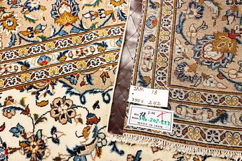 A Kashan carpet, c. 340 x 242 cm.