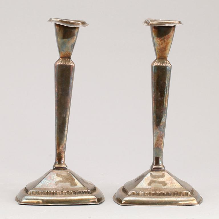 LJUSSTAKAR, ett par, silver, 1900-tal.
