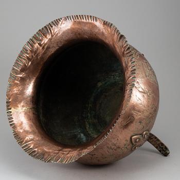 A 19th century copper flower pot.