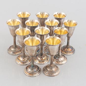 Karl-Axel Karlsson Silversmed, twelve sterling silver cups, Stockholm 1975-85.