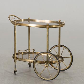 A brass serving trolley.