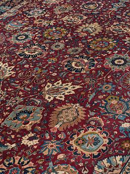 A carpet, semi-antique Tabriz, ca 413,5 x 328,5 cm.