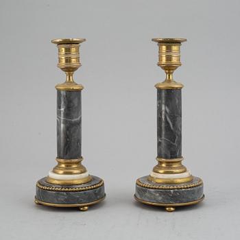 A pair of French ca 1800 candlesticks.