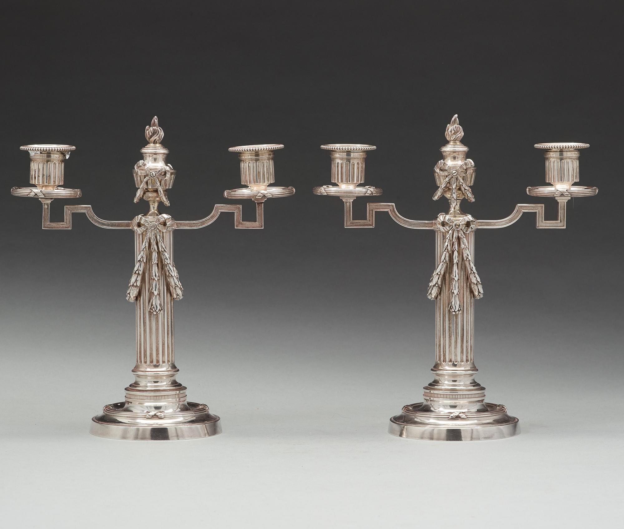 A pair of Fabergé, silver candelabra, workmaster Julius Rappoport, S.t Petersburg before 1899.