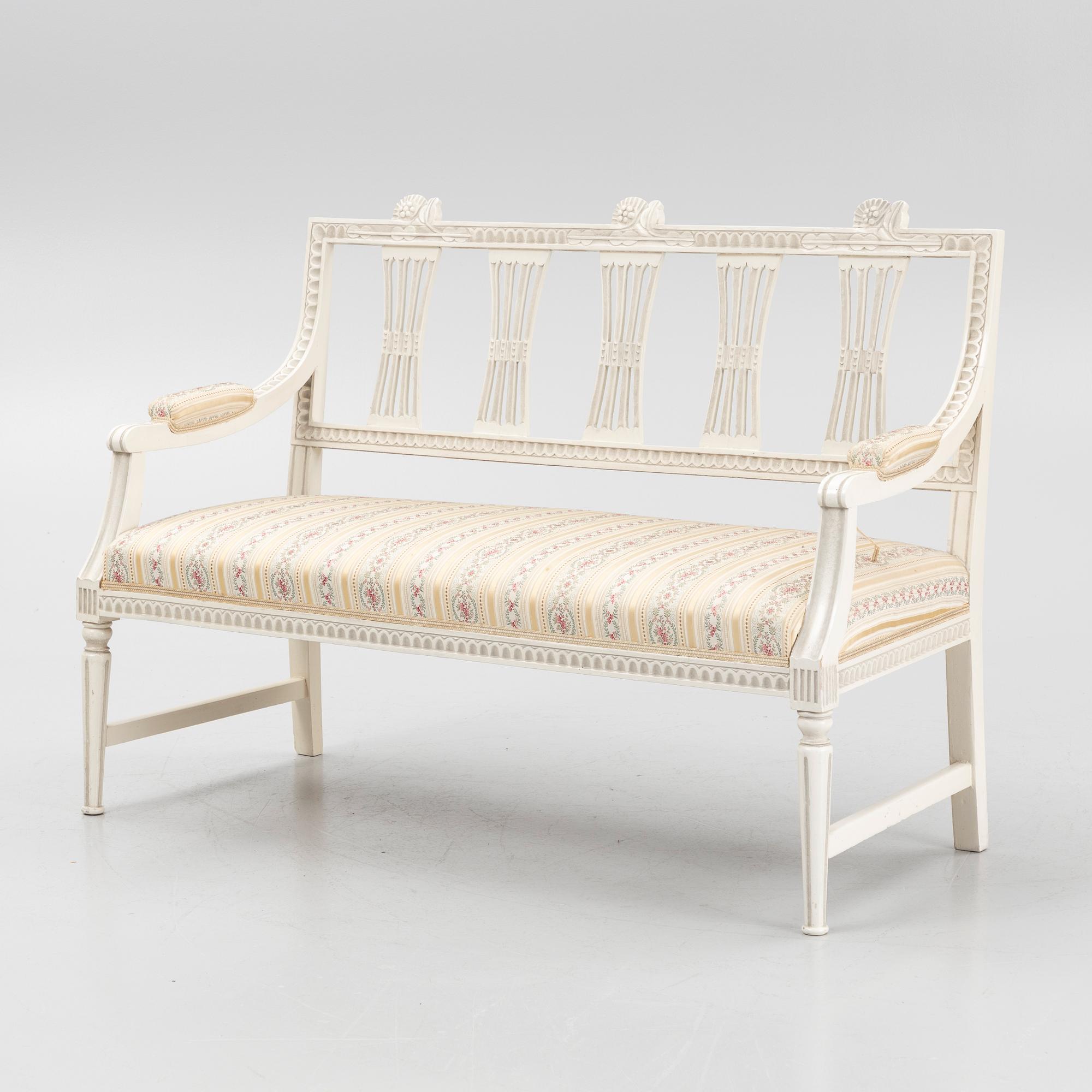 A sofa, three chairs and a table, Gustaivan style and of the Gustavian period, 19th-20th century.