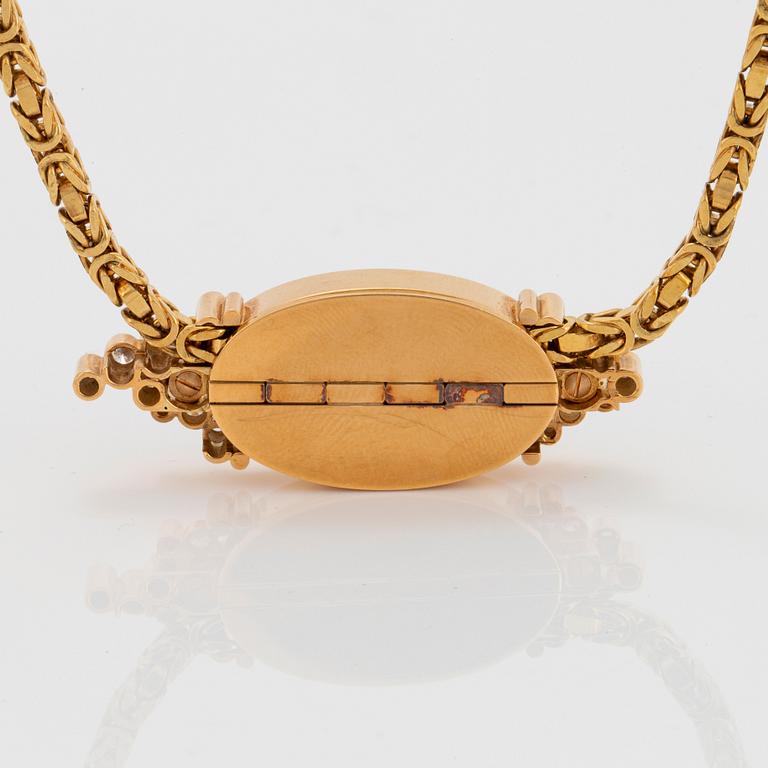 Hängsmycke 18K guld med en opal och runda briljantslipade diamanter.