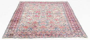 An Oriental carpet, c. 272 x 180 cm.