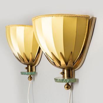 A pair of Swedish Modern brass wall lights, 1940's.