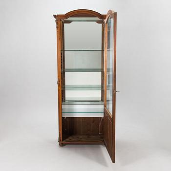 A late 19th century glass vitrine.