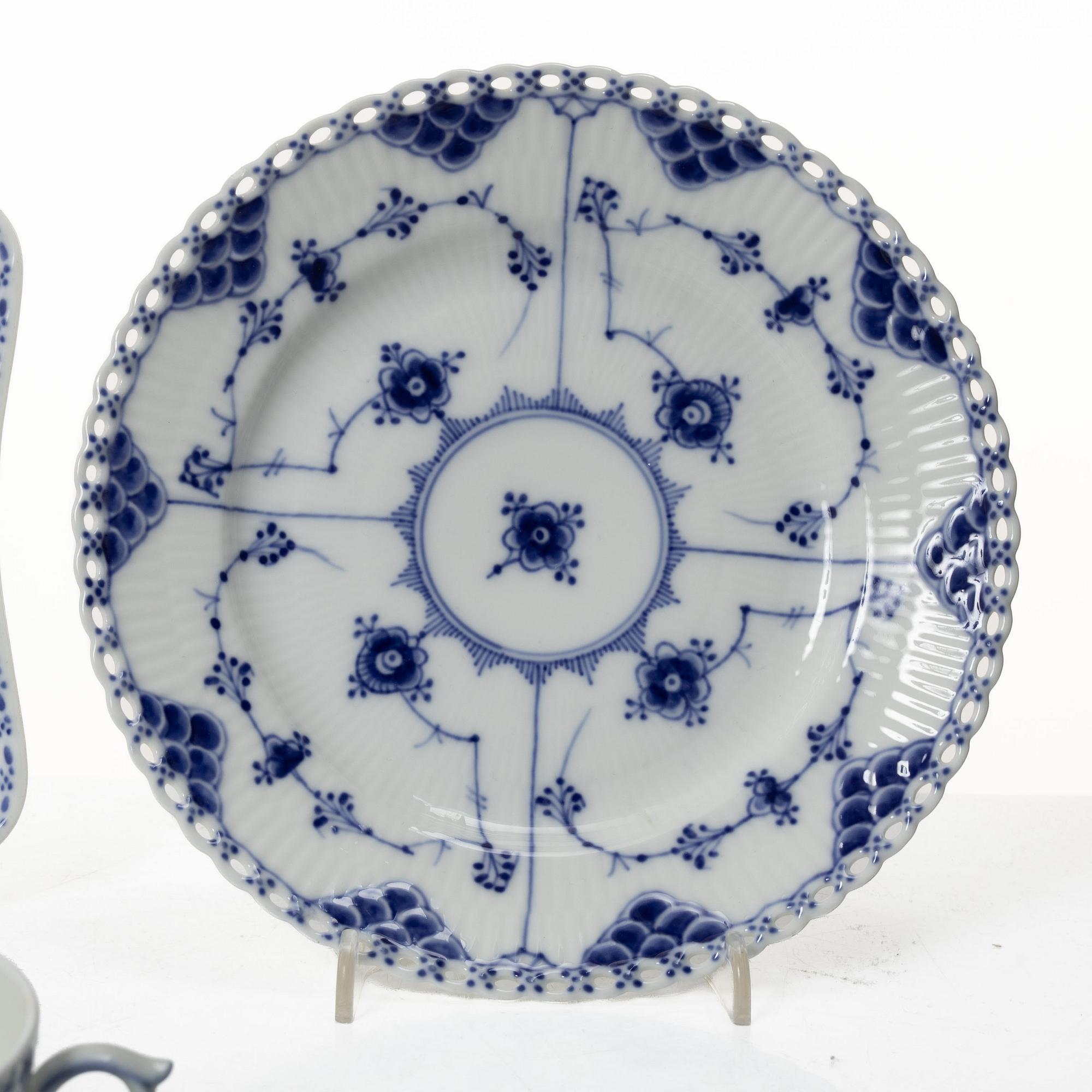 Royal Copenhagen, A 22 piece tea set, half laced and fukll laced, "Musselmalet", Denmark.