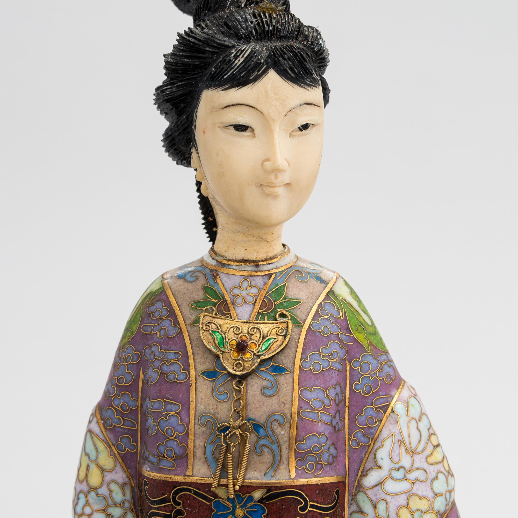 A cloisonné enamel Figurin from China, 1900s.