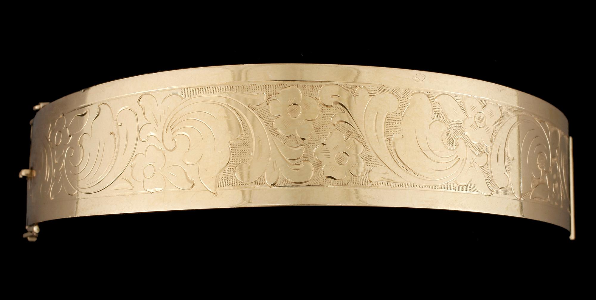 ARMRING, guld 18k, Guldvaruhuset AB, Stockholm 1964. Vikt ca 12,5 gram.