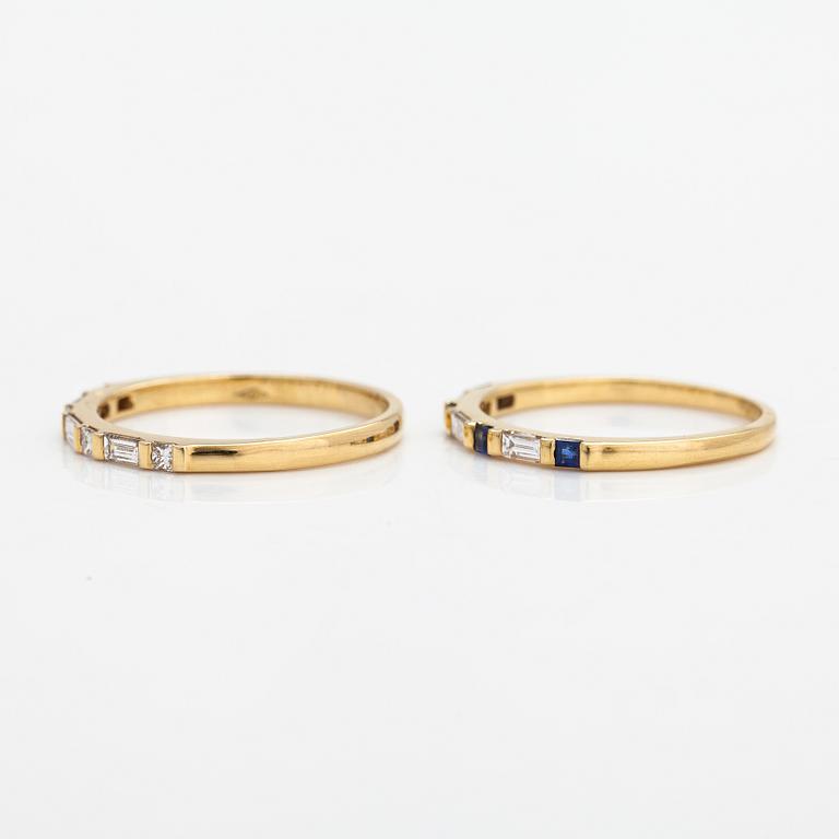 A set of 2 rings made of 18K gold with diamonds ca. 0.39 ct in total and sapphires.